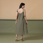 Back View of a Model wearing 6-Way Convertible Moss Green Tie Dye Skirt Dress