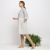 Left View of a Model wearing Handspun Cotton A-Line Shift Dress