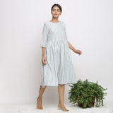 Front View of a Model wearing Off-White Handspun Cotton Muslin Dress