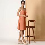 Right View of a Model wearing Apricot Cotton Flax Strappy Slit Dress