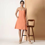 Front View of a Model wearing Apricot Cotton Flax Strappy Slit Dress