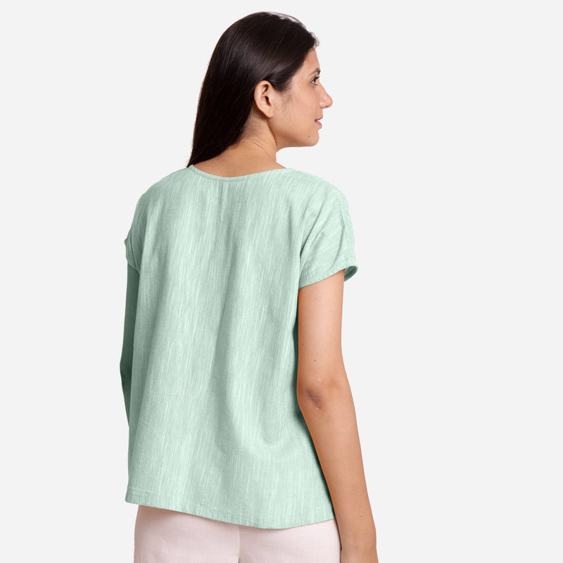 Back View of a Model wearing Aqua 100% Cotton Boat Neck A-Line Top