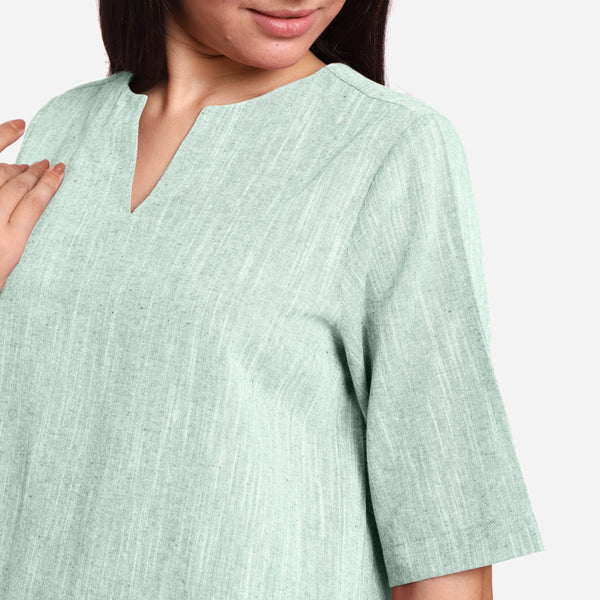 Front Detail of a Model wearing Aqua 100% Cotton High Low Tunic Top