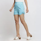 Left View of a Model wearing Aqua Blue Tie-Dye Cotton Elasticated Short Shorts