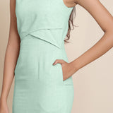 Front Detail of a Model wearing Aqua Knee Length Cotton Sheath Dress