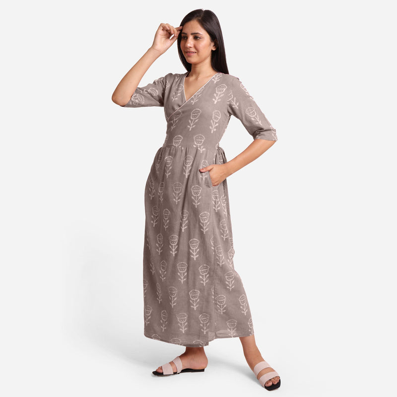 Left View of a Model wearing Ash Grey Dabu Print 100% Cotton Wrap Dress