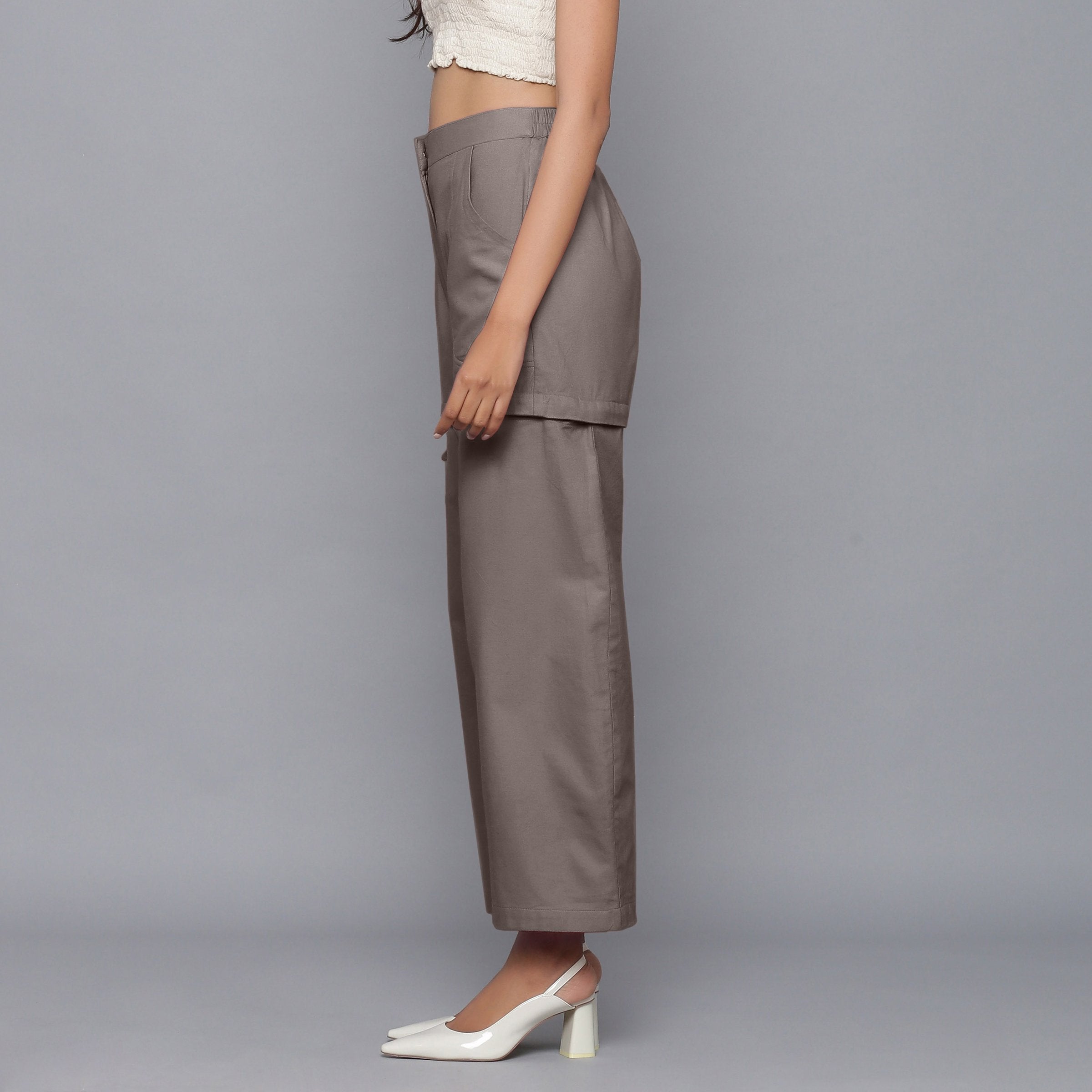 Left View of a Model wearing Ash Grey Flannel Convertible Pant Shorts