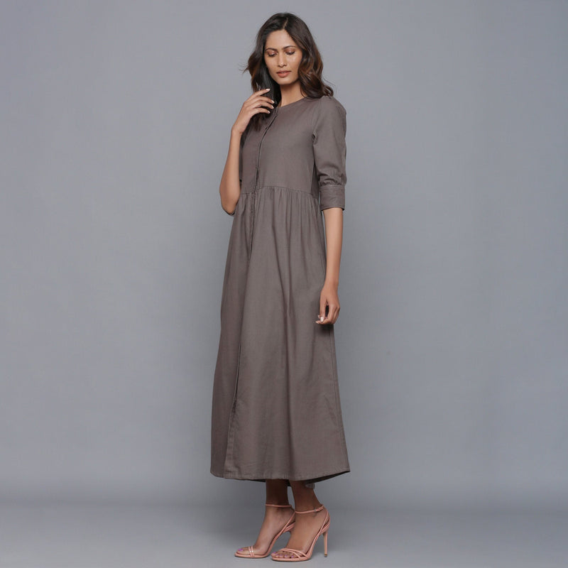 Left View of a Model wearing Ash Grey Flannel Gathered Dress