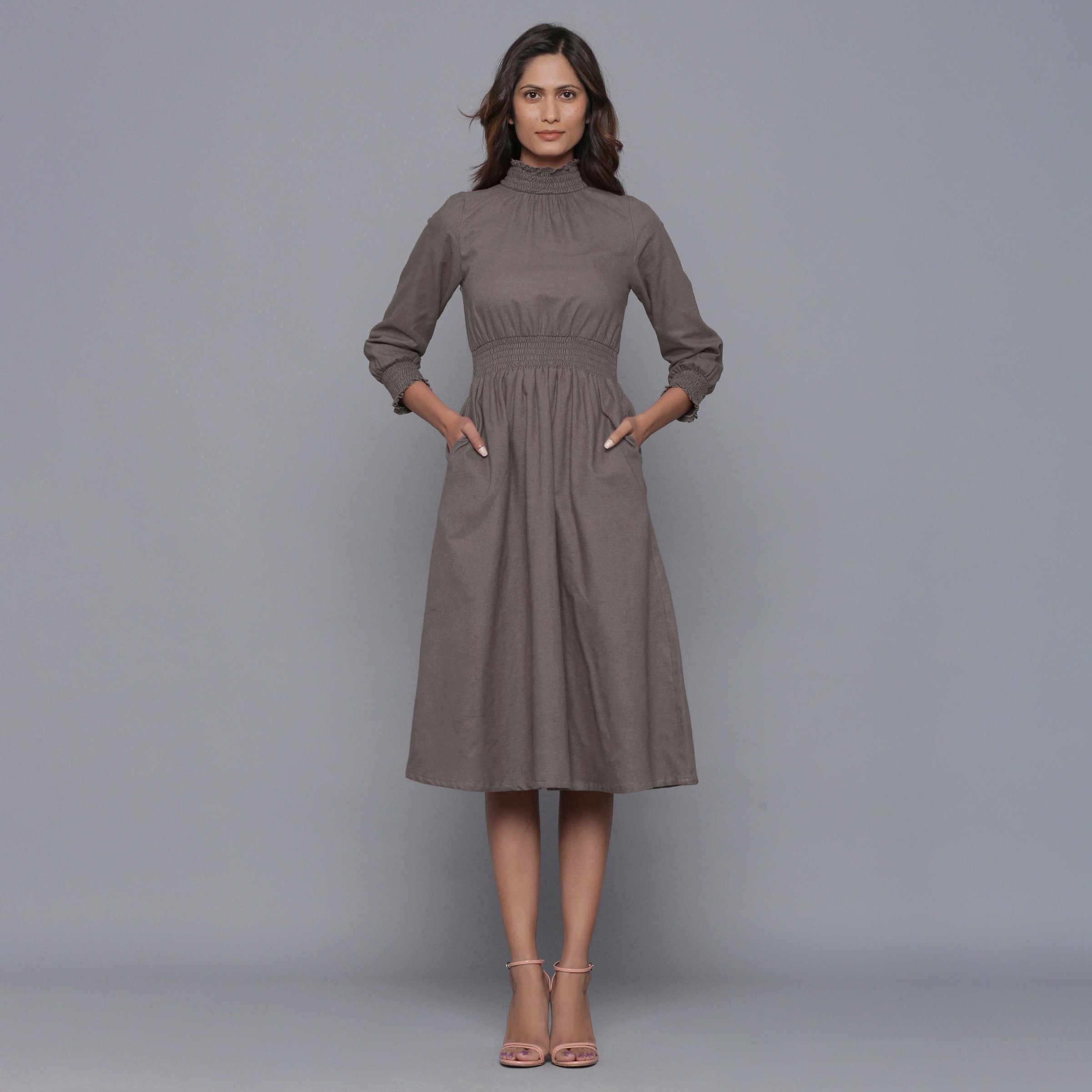 Front View of a Model wearing Ash Grey Flannel High Neck Midi Dress