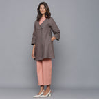 Left View of a Model wearing Ash Grey Relaxed Flannel Wrap Overlay