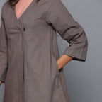 Left Detail of a Model wearing Ash Grey Relaxed Flannel Wrap Overlay