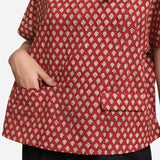 Front Detail of a Model wearing Brick Red Block Print Flared Round Neck Cotton Top