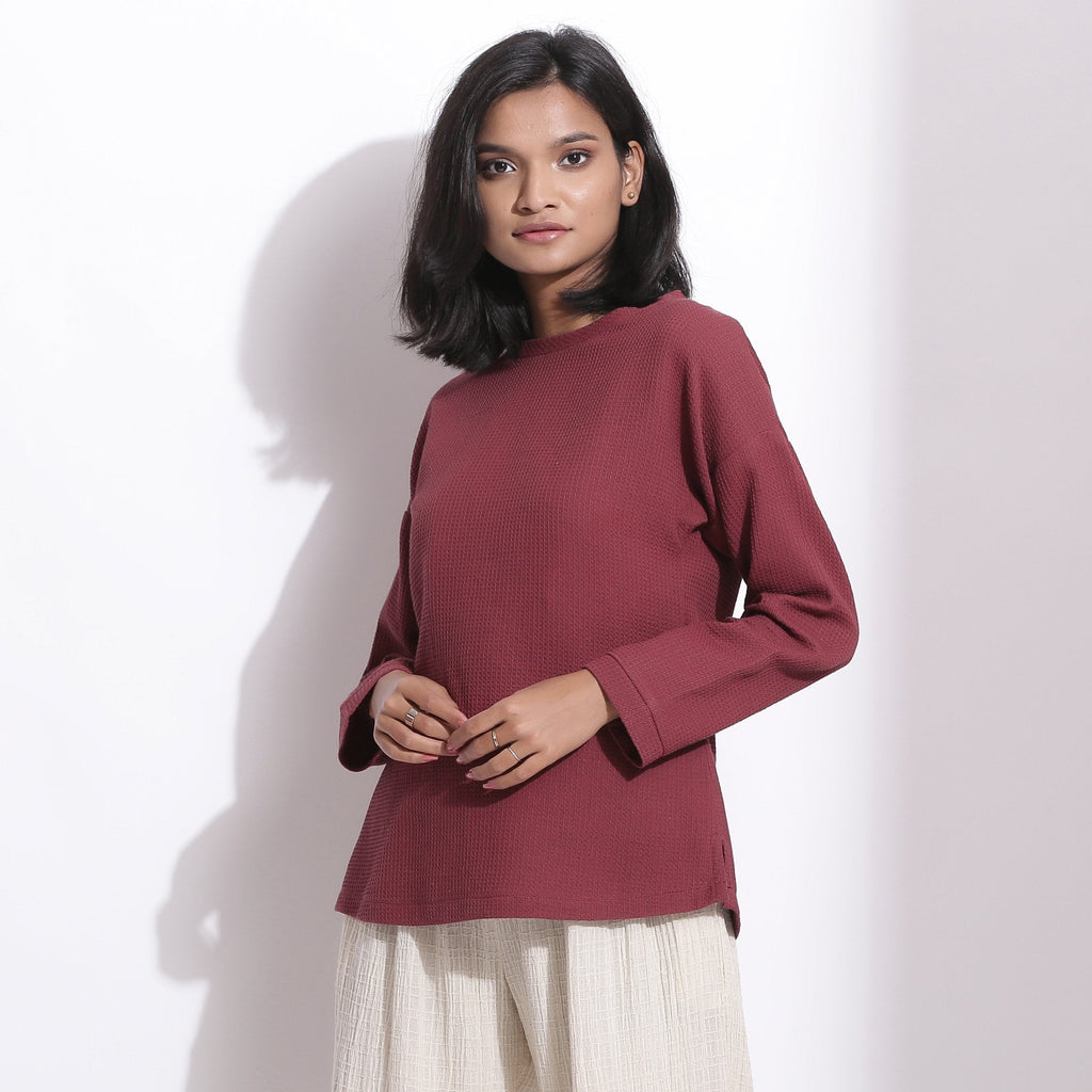 Left View of a Model wearing Barn Red Warm Cotton Waffle Drop Shoulder Top