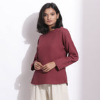 Left View of a Model wearing Barn Red Warm Cotton Waffle Drop Shoulder Top