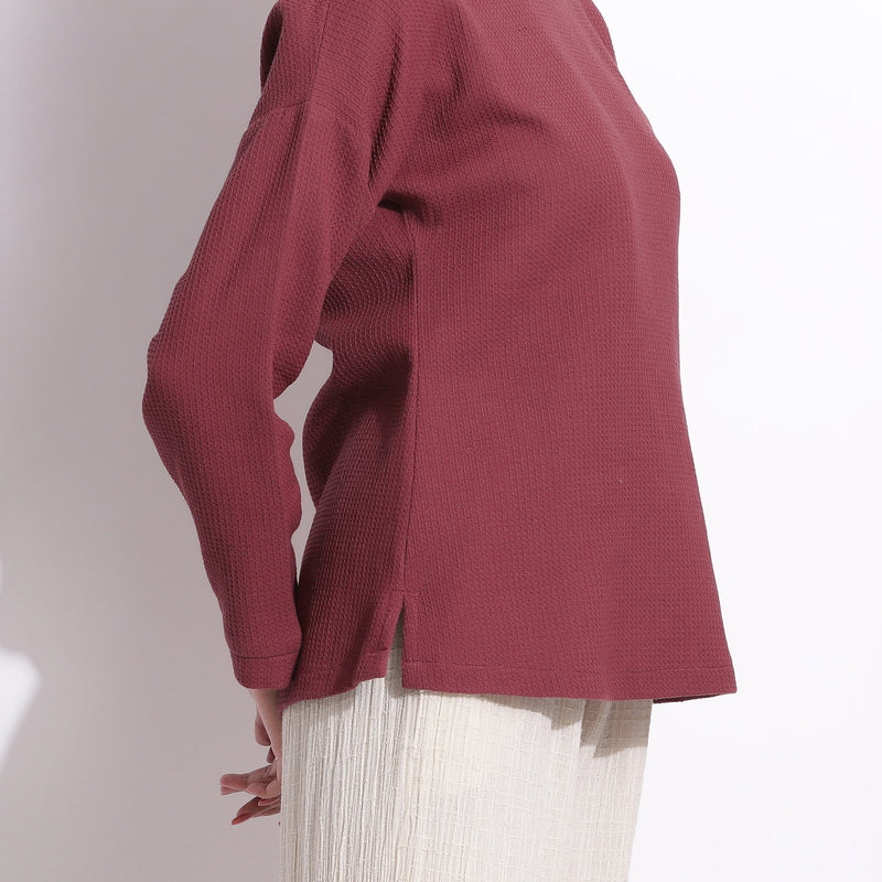 Right Detail of a Model wearing Barn Red Warm Cotton Waffle Drop Shoulder Top