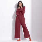 Front View of a Model wearing Barn Red Cotton Waffle Turtle Neck Overalls