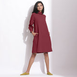 Front View of a Model wearing Barn Red Cotton Waffle Turtleneck Dress