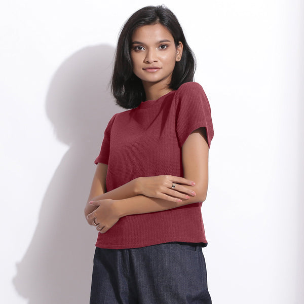 Front View of a Model wearing Barn Red Cotton Waffle Woven T-Shirt