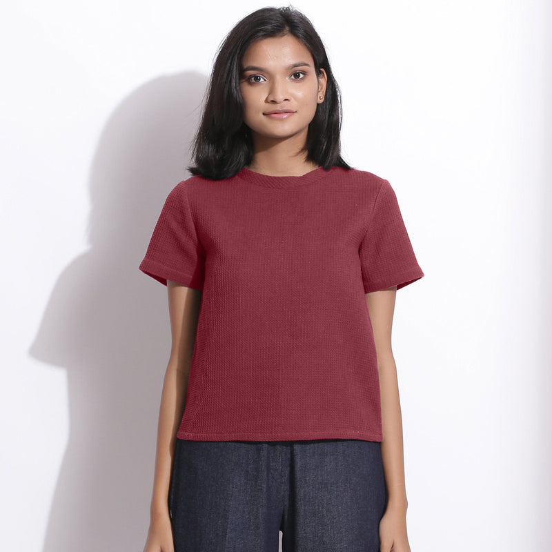 Front View of a Model wearing Barn Red Cotton Waffle Woven T-Shirt