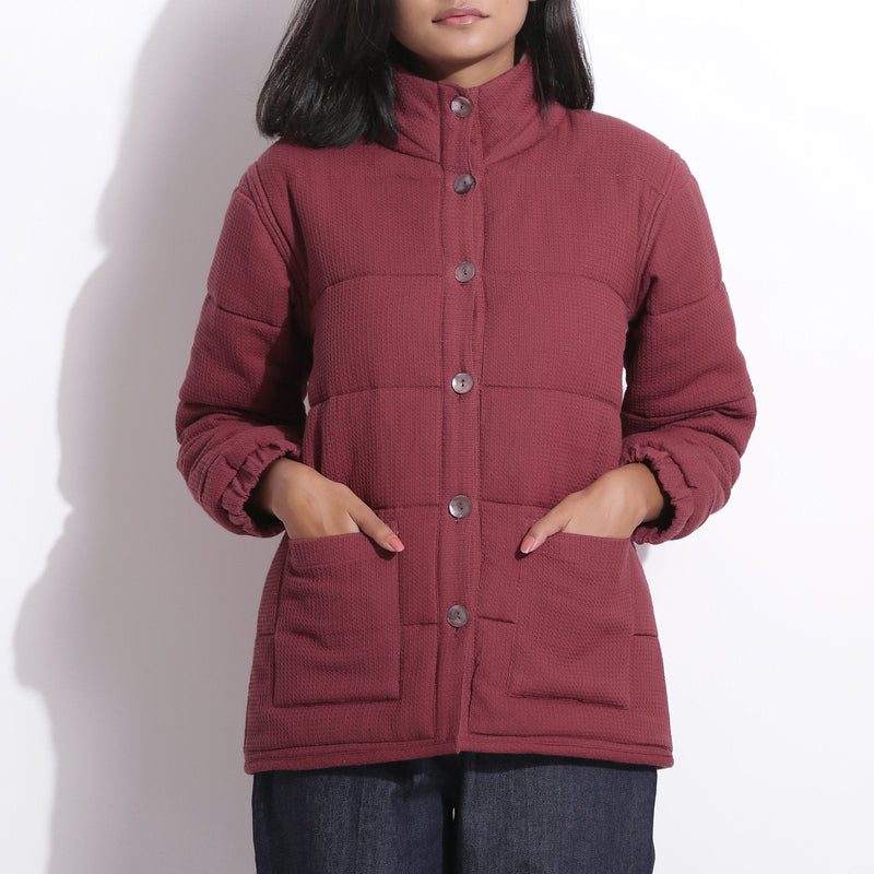Front Detail of a Model wearing Barn Red Warm Cotton Waffle Quilted Puffer Jacket