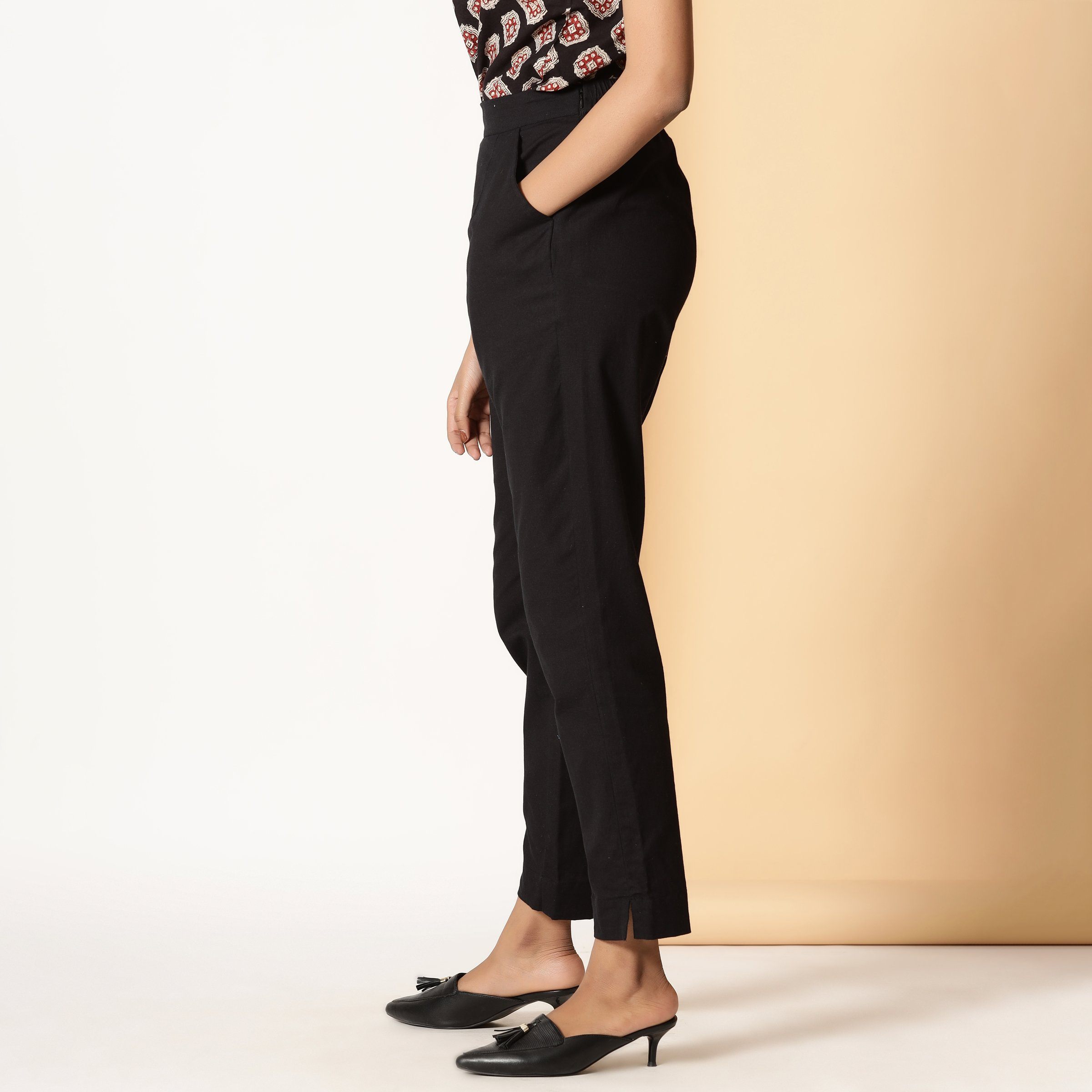 Left View of a Model wearing Basic Black Comfy Cotton Flax Tapered Pant
