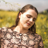 Front Detail of a Model wearing Beige Bagru Block Print Cotton Flared Maxi Dress