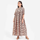 Front View of a Model wearing Beige Bagru Block Print Cotton Flared Maxi Dress