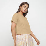 Right View of a Model wearing Beige Boat Neck Half Sleeve Cotton Top