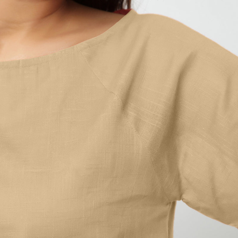 Front Detail of a Model wearing Beige Boat Neck Half Sleeve Cotton Top