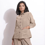 Right View of a Model wearing Beige Corduroy Button-Down Pocket Shirt