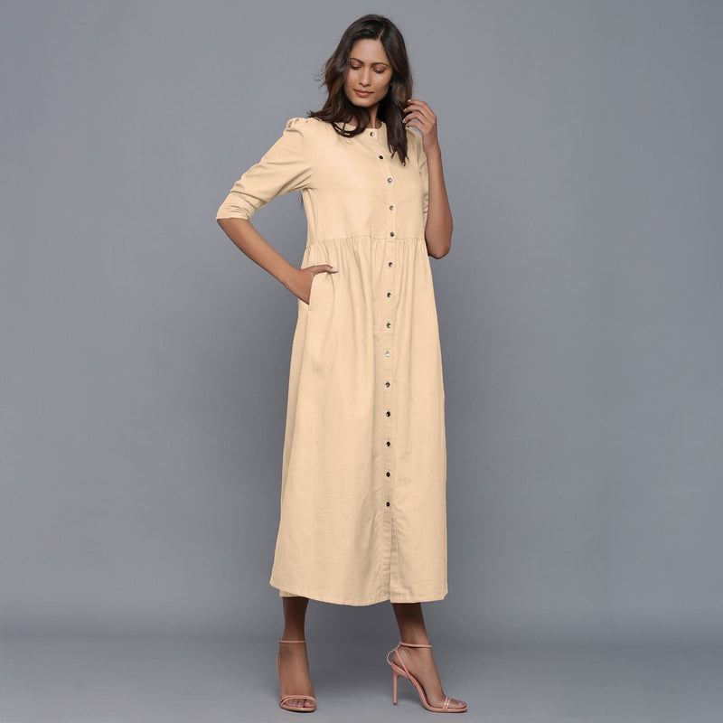 Right View of a Model wearing Beige Cotton Flannel Gathered Dress