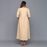 Back View of a Model wearing Beige Cotton Flannel Gathered Dress