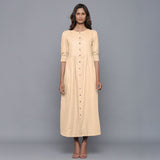 Front View of a Model wearing Beige Cotton Flannel Gathered Dress