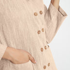 Front Detail of a Model wearing Beige Cotton Flax Button-Down Jacket