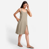 Right View of a Model wearing Beige Cotton Flax Strappy Slit Dress