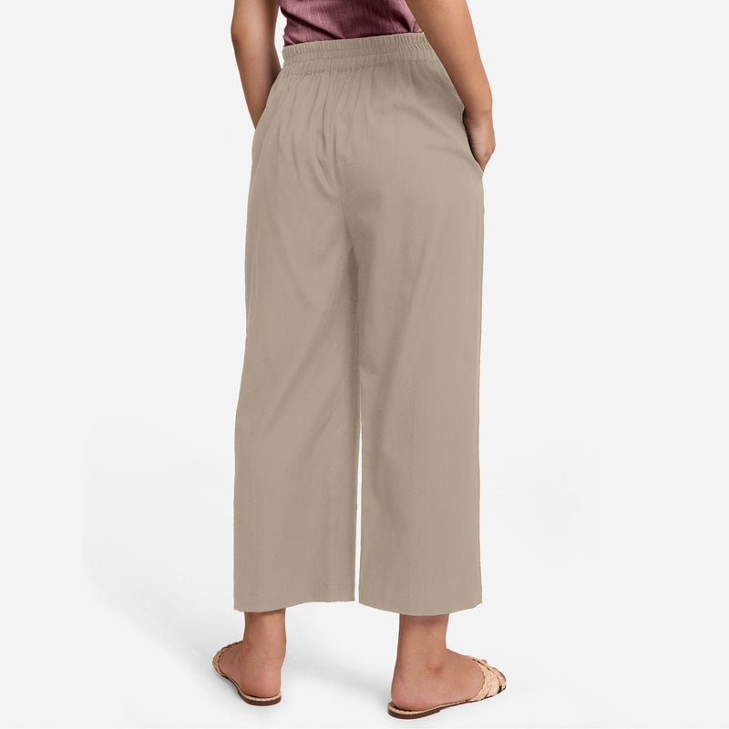 Back View of a Model wearing Beige Cotton Flax Wide Legged Pant