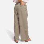 Back View of a Model wearing Beige Cotton Flax Wide Legged Straight Pant