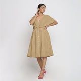 Front View of a Model wearing Beige Deep Neck Bohemian Frilled Dress