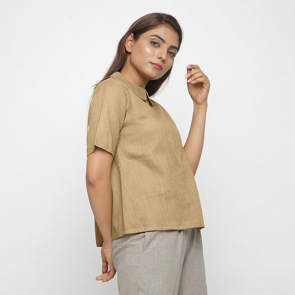 Right View of a Model wearing Beige Everyday Essential A-Line Top