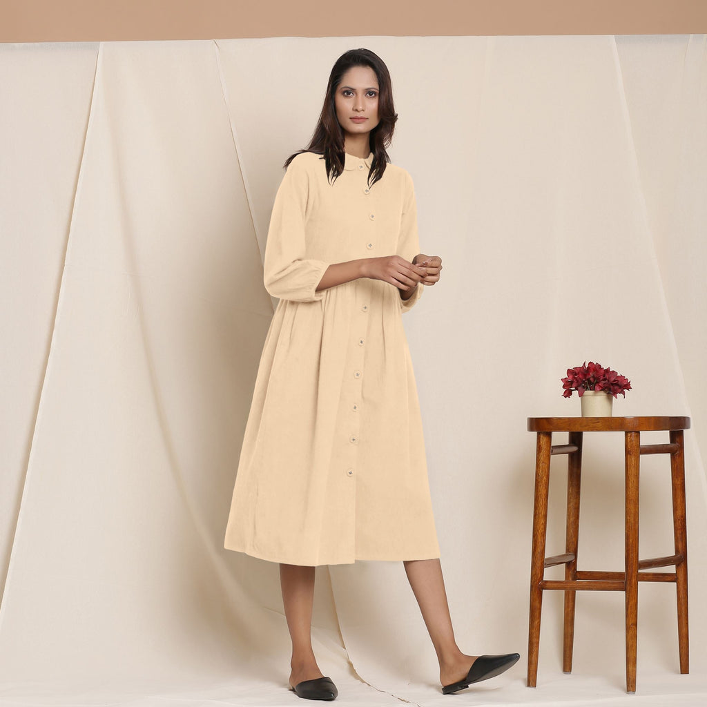 Right View of a Model wearing Beige Flannel Peter Pan Gathered Dress
