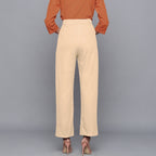Back View of a Model wearing Beige Flannel Rolled-Up Straight Pant