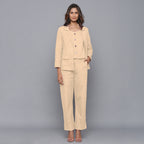 Front View of a Model wearing Beige Flannel Rolled-Up Straight Pant