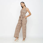 Left View of a Model wearing Bagru Print Beige Floral Jumpsuit