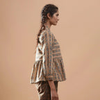 Right View of a Model wearing Beige Floral Warm Block Print Cotton Shirt