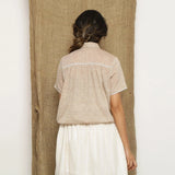 Back View of a Model wearing Beige Handspun Comfort Fit Balloon Top