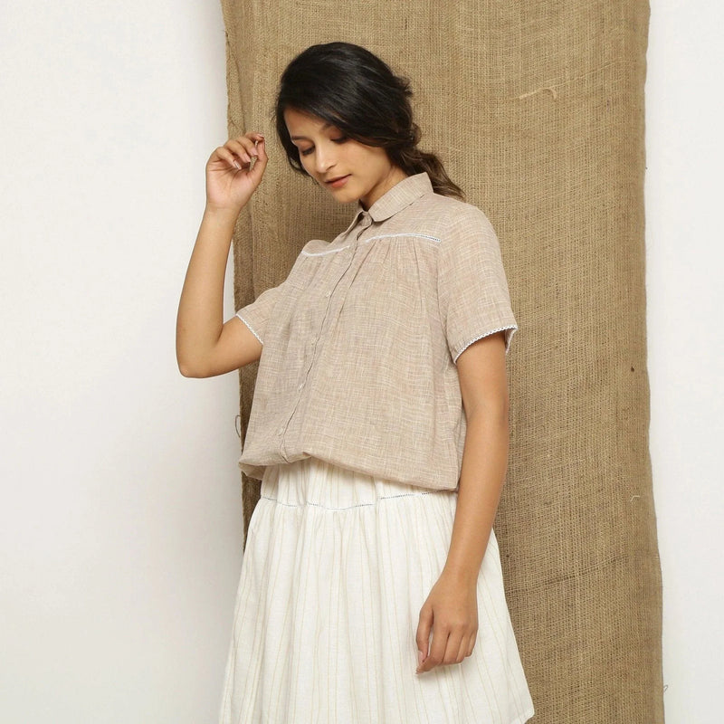 Left View of a Model wearing Beige Handspun Comfort Fit Balloon Top