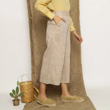 Right View of a Model wearing Beige Handspun Cotton Wide Legged Culotte