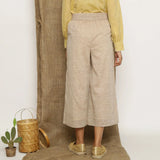 Back View of a Model wearing Beige Handspun Cotton Wide Legged Culotte