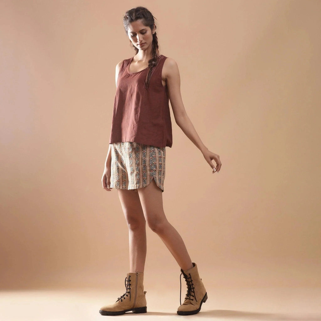 Left View of a Model wearing Beige Kalamkari Comfort Fit Shorts