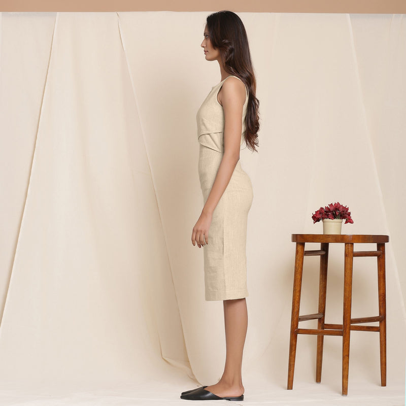 Left View of a Model wearing Beige Knee Length Cotton Sheath Dress
